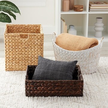 tan, white and brown water hyacinth baskets